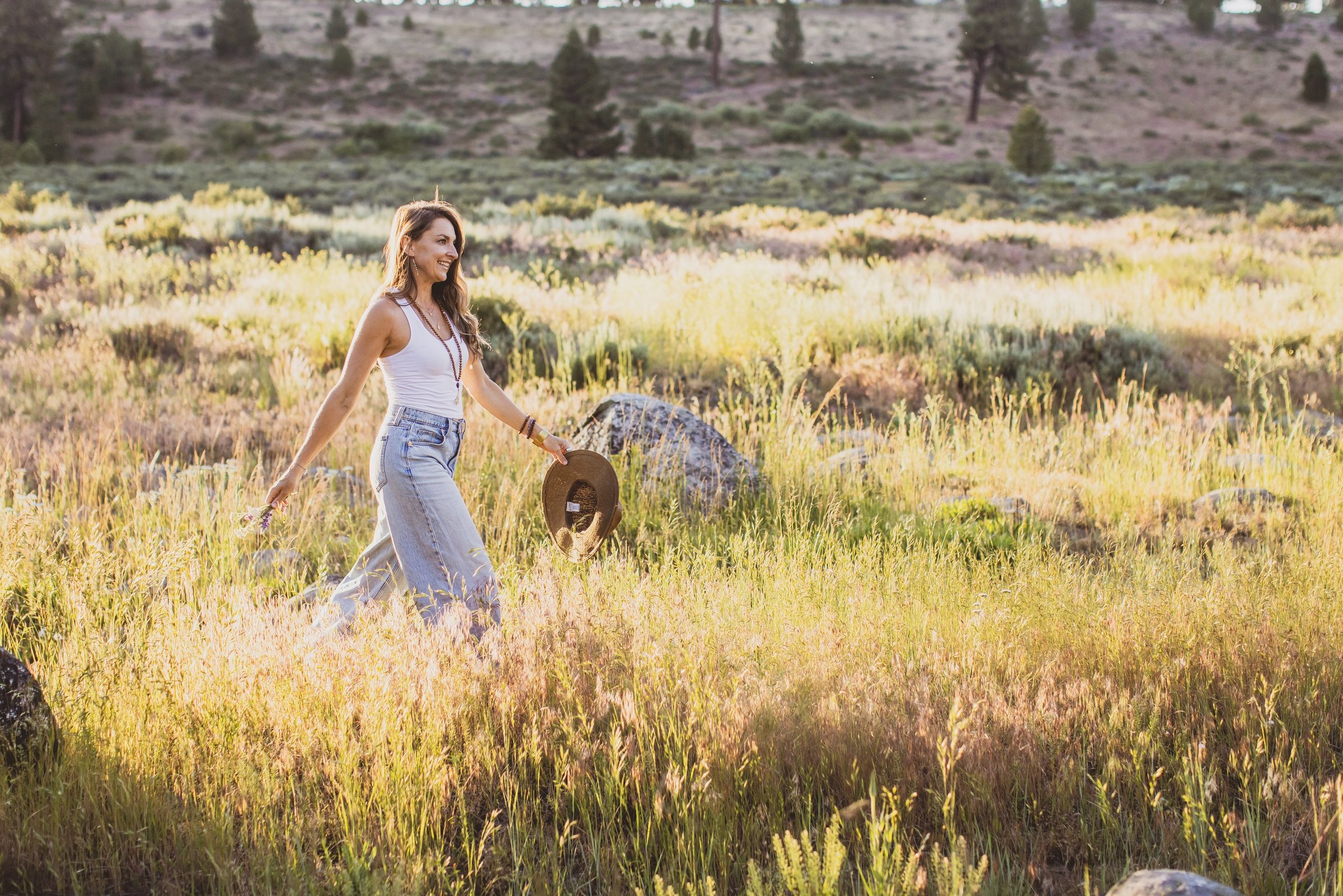 Kaila Leilani walking through a high Sierra meadow at golden hour